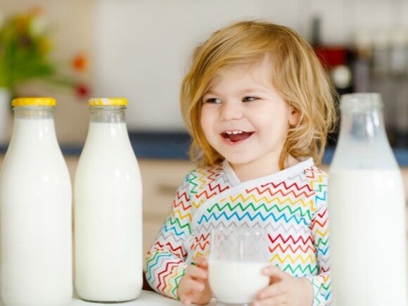 Toddler drinking cows milk