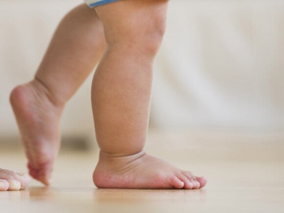 child's feet walking 